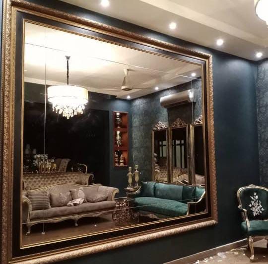 Living room lighting, chandelier and downlights by PTP
