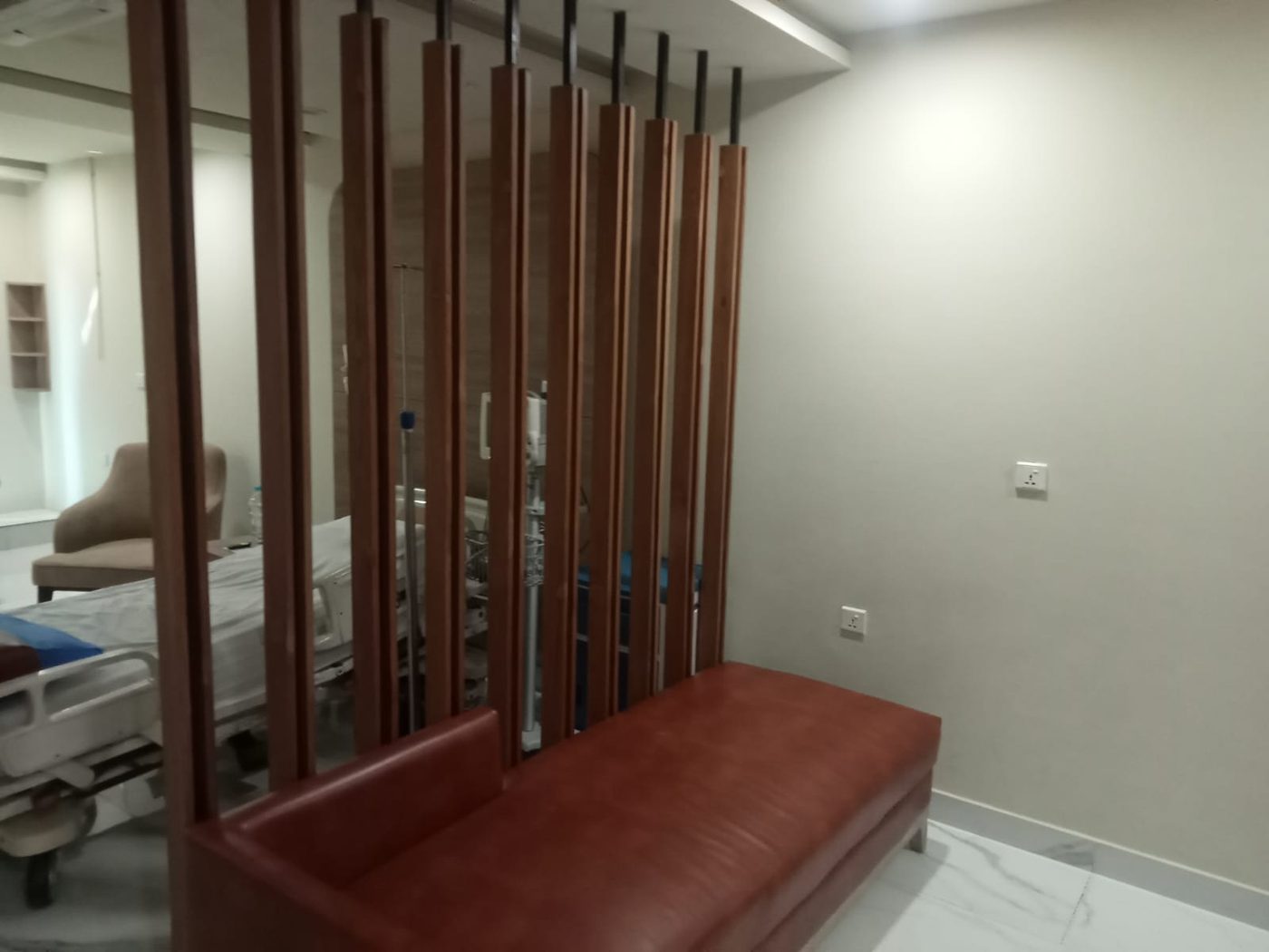 Timber slat partition and upholstered bench by PTP