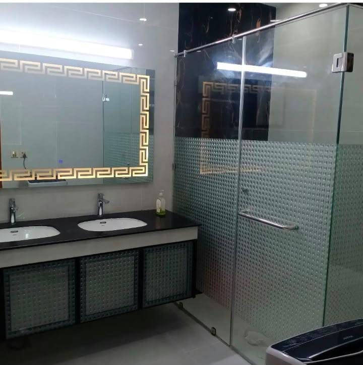 Washroom vanity, LED mirror and glass shower